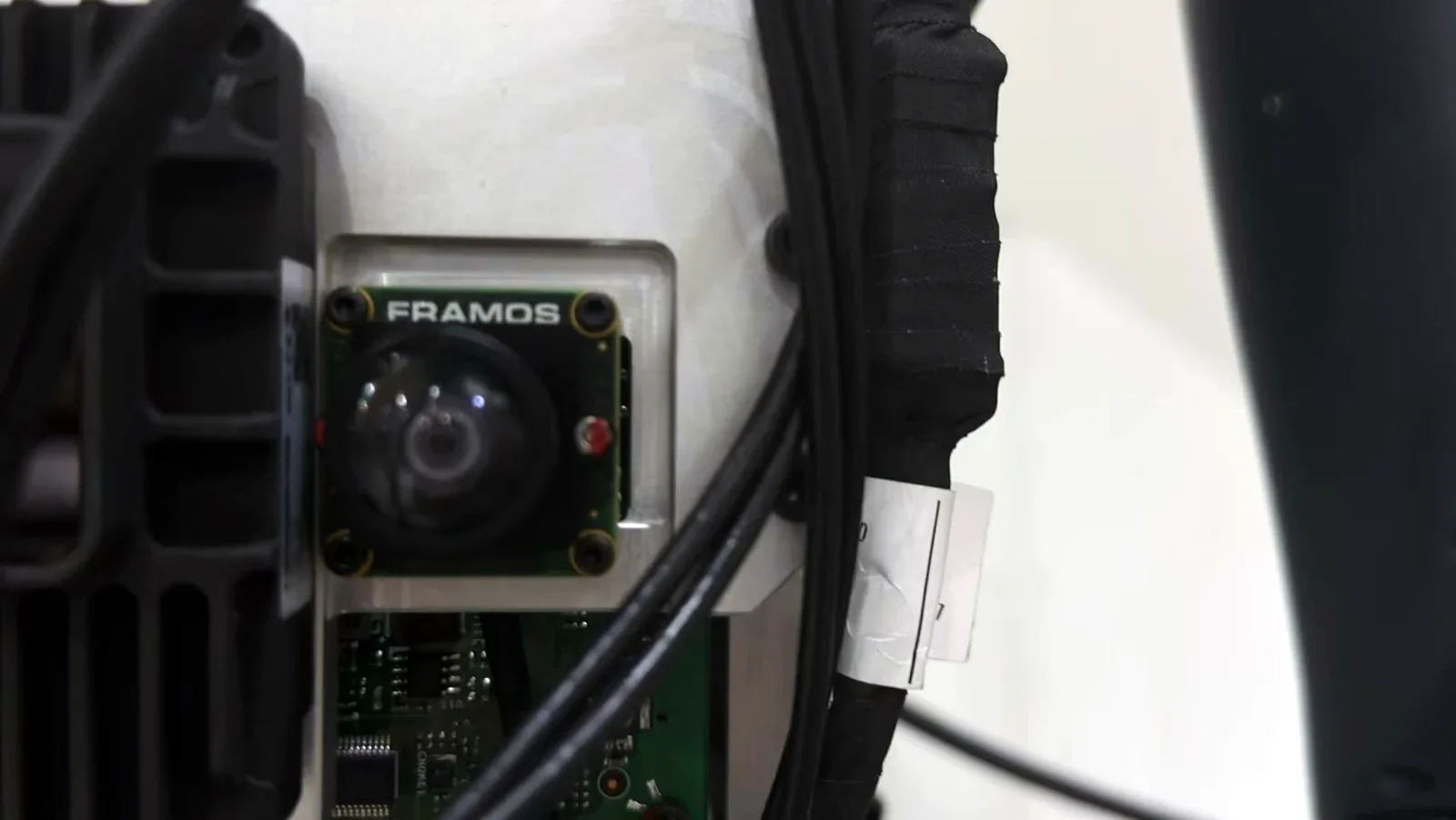 Close view of one of the two cameras mounted on the humanoid robot